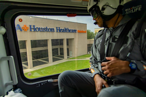 An AIRLIFE flight paramedic and crew take off from HCA Houston Healthcare Mainland.